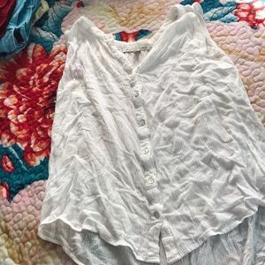 See through button up. Perfect for the beach.